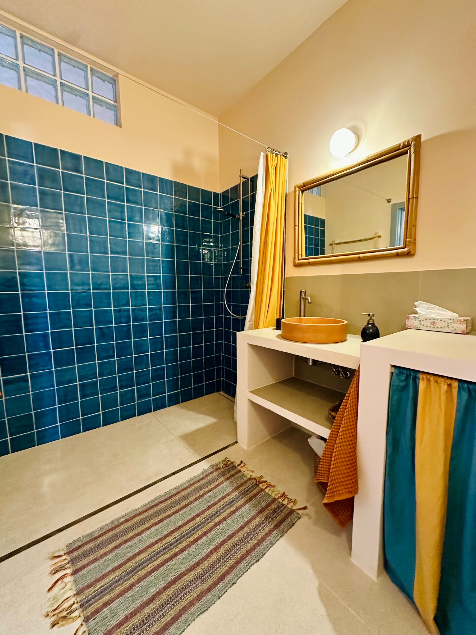 Studio Indigo — bathroom with sliding door